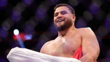 tai-tuivasa-proposes-shoey-out-of-derrick-lewis-cup-with-jpg