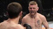 tim-elliott-for-sure-illegally-grabbed-tagir-ulanbekovs-glove-at-jpg