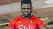 UFC champion Ngannou reacts to the defeat of the Cameroon national football team