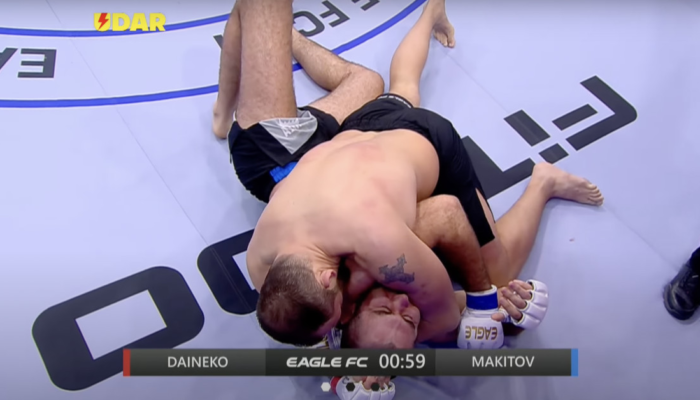 missed-fists-fighter-locks-in-breaststroke-choke-arm-triangle-variation-png