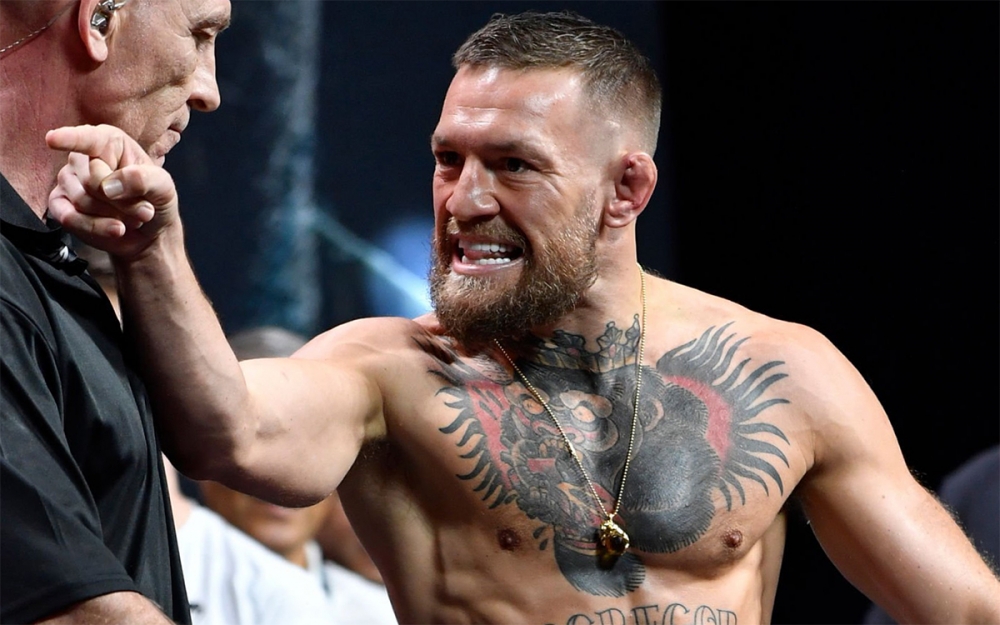 Conor McGregor schwört, den im Krankenhaus befindlichen Dustin Poirier zu beerdigen