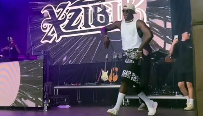 Israel Adesanya performed with rapper Exibit in front of a crowd of thousands