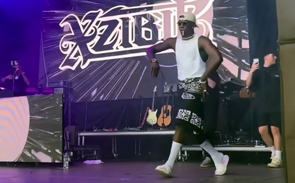 Israel Adesanya performed with rapper Exibit in front of a crowd of thousands